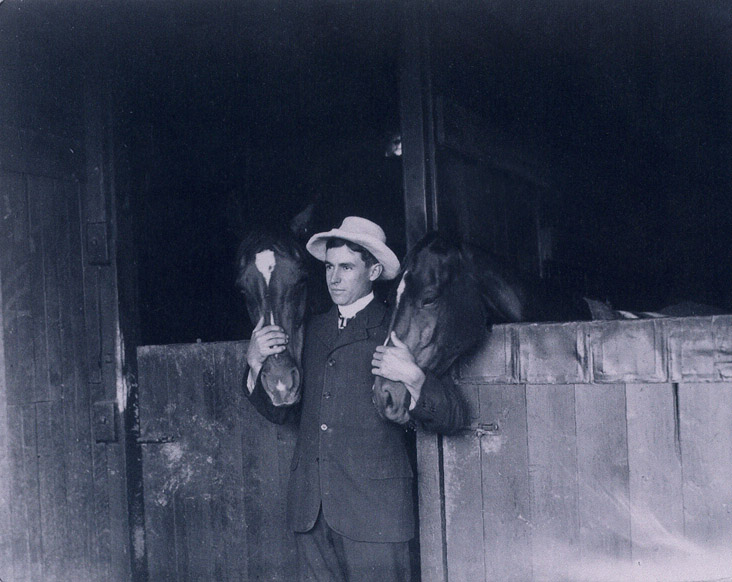 Lucius Manning with two of his horses