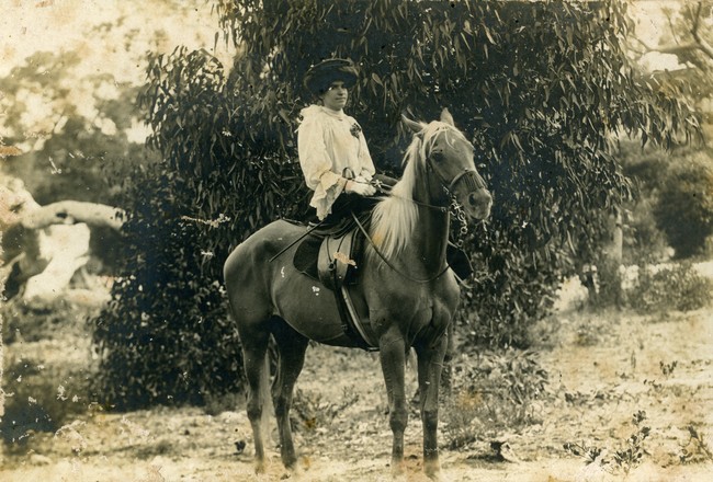 Miss De San Miguel riding side saddle.