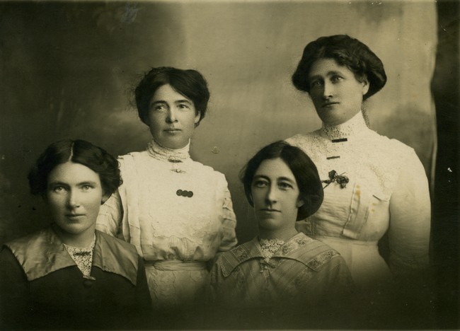 Photograph of four women.